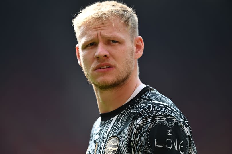 Aaron Ramsdale of Arsenal looks on as he warms up prior to the Premier League match between Manchester United and Arsenal FC at Old Trafford on May 12, 2024 in Manchester, England.