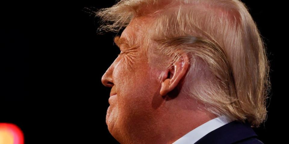 U.S. President Donald Trump reacts during the third and final presidential debate with Democratic presidential nominee Joe Biden at Belmont University in Nashville, Tennessee, U.S., October 22, 2020. REUTERS/Jim Bourg/Pool