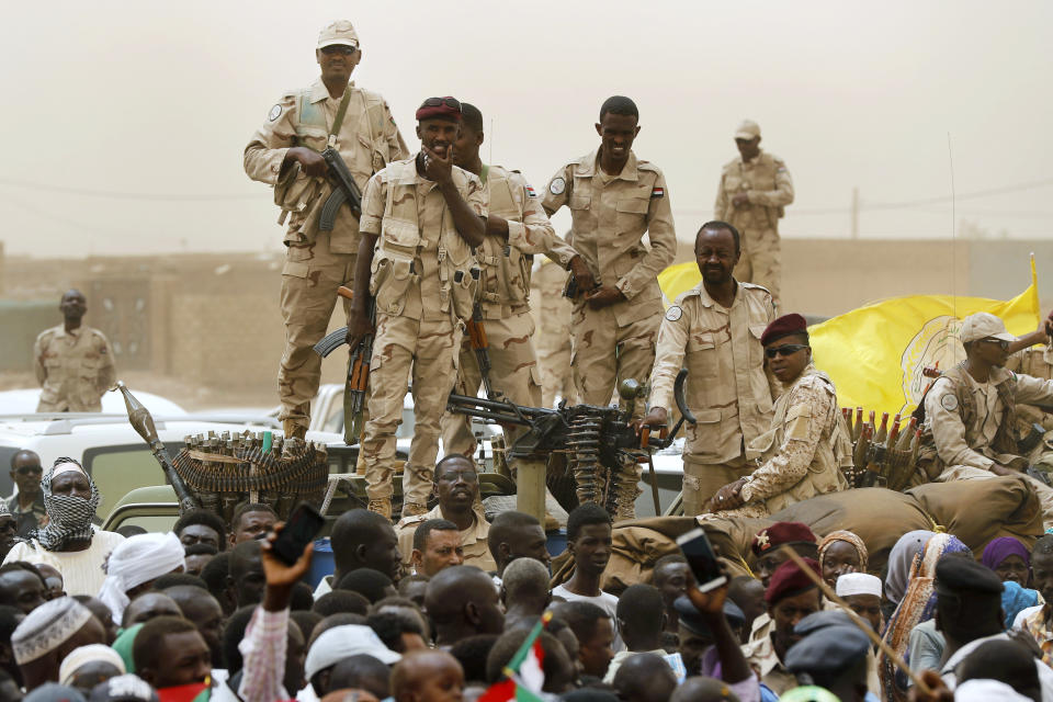 Sudanese soldiers from the Rapid Support Forces unit stand on their vehicle during a military-backed rally, in Mayo district, south of Khartoum, Sudan, Saturday, June 29, 2019. The United States imposed sanctions Wednesday, Sept. 6, 2023, on a Sudanese Rapid Support Forces paramilitary commander Abdelrahim Hamdan Dagalo for acts of violence and human rights abuses committed by his troops in their monthslong conflict with Sudan's army. (AP Photo/Hussein Malla, File)
