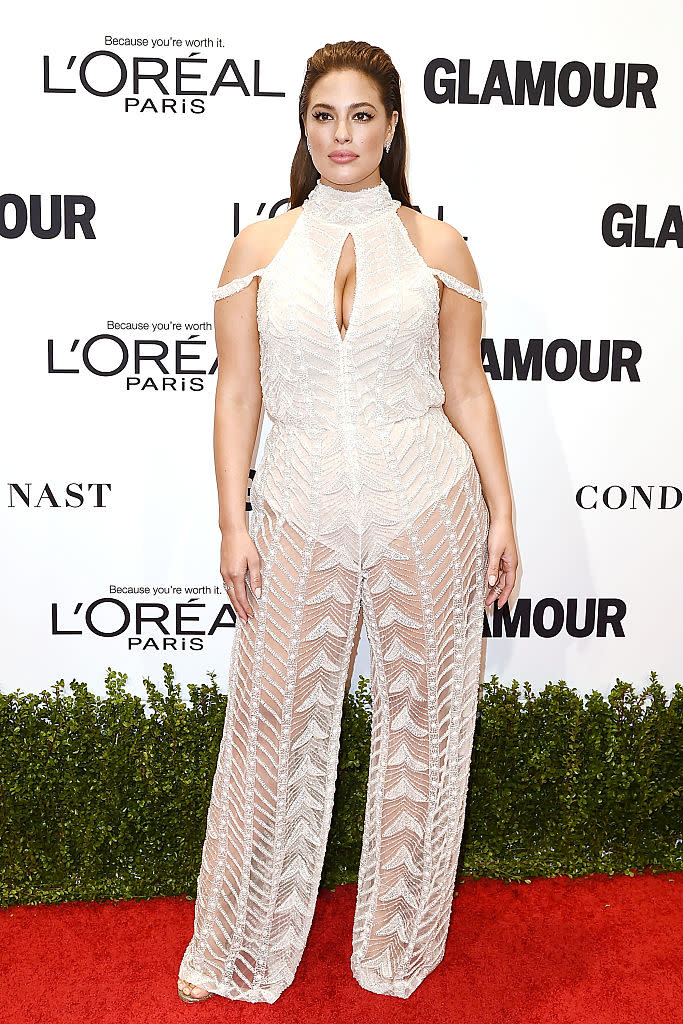 <p>Model Ashley Graham wears a beaded, sheer-pant jumpsuit at the Glamour Women of the Year Awards in 2016. (Photo: Getty Images) </p>