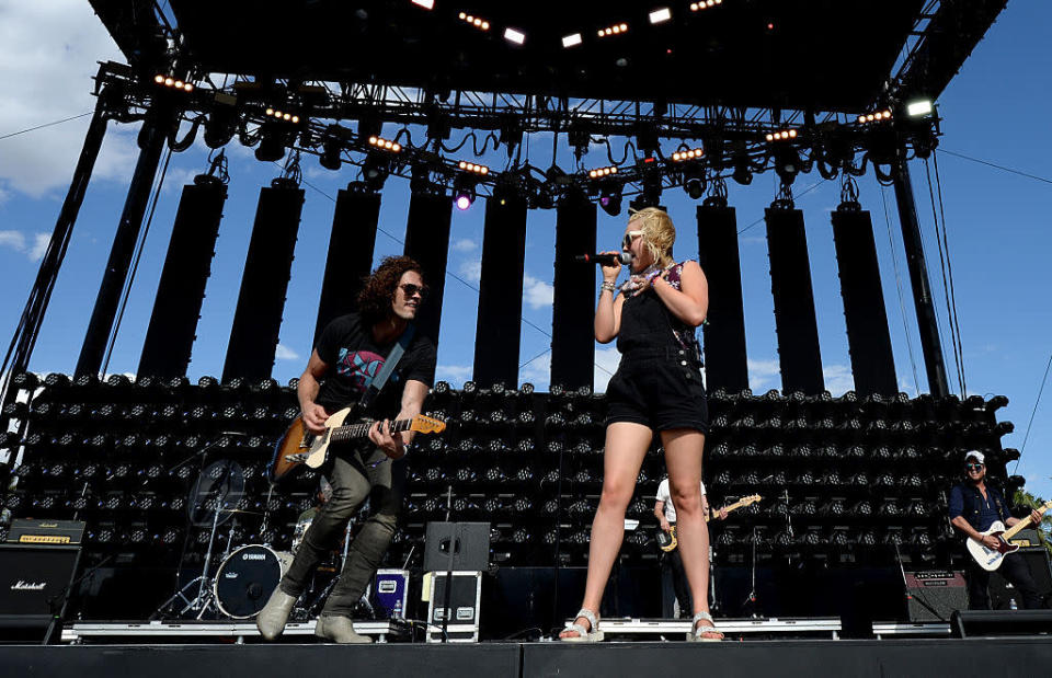 Dane Kinser and singer RaeLynn perform onstage during 2016 Stagecoach California’s Country Music Festival at Empire Polo Club on May 01, 2016 in Indio, California. (Photo: Kevin Winter/Getty Images)