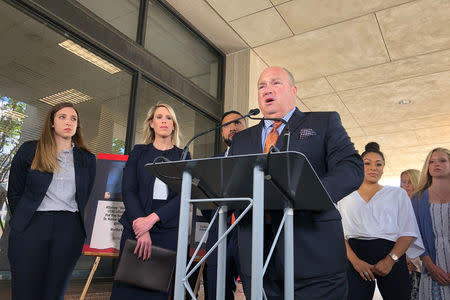 Attorney John Manley, who represents several gymnasts abused by a disgraced former USA Gymnastics team doctor, speaks at a news conference calling on Texas to step up its investigation of a training facility used by the national team in the state in Austin, Texas, U.S., May 10, 2018. REUTERS/Jon Herskovitz