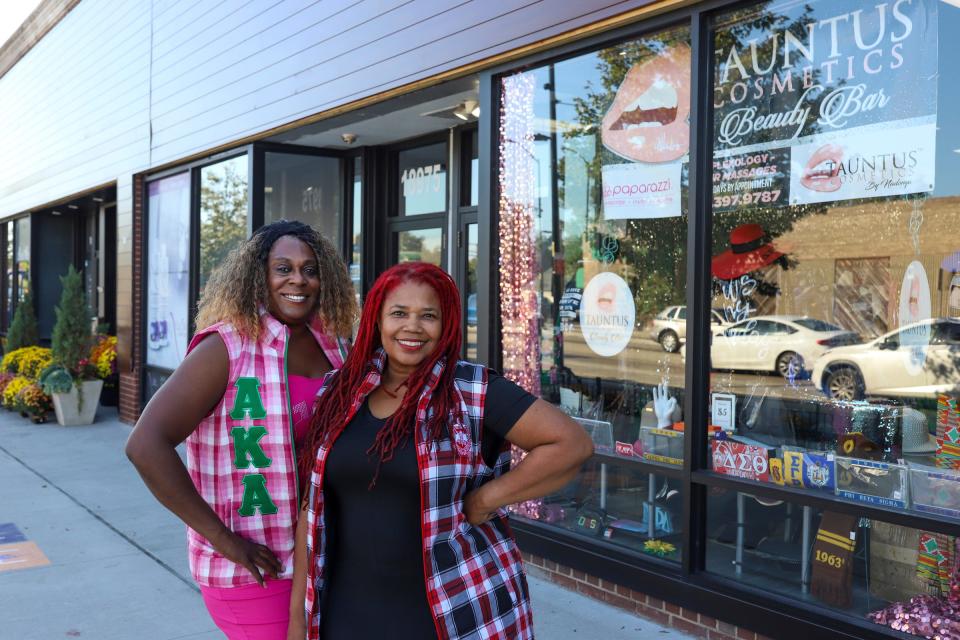 Dennae Hawkins, left, and Nadonya Muslim, co-owners of Tauntus Beauty Bar, the only store in Detroit that is licensed to sell "Divine Nine" clothing and other items, as they appeared on Oct. 3, 2023. Hawkins and Muslim have been making preparations to stock their store with enough items to meet the demands of customers seeking merchandise connected to the presidential election and Kamala Harris campaign.