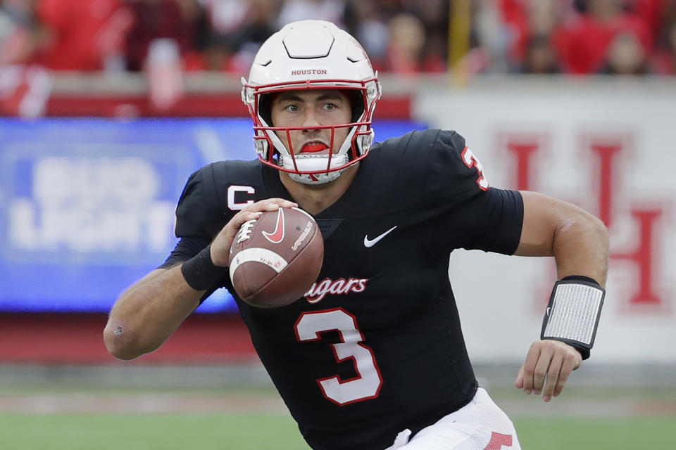 FILE - Houston quarterback Clayton Tune (3) plays during the first half of an NCAA college football game against South Florida, Saturday, Oct. 29, 2022, in Houston. In the first nine drafts after former sixth-round pick Tom Brady won his first Super Bowl following the 2002 season, there were an average of seven QBs taken in the final three rounds of the draft. (AP Photo/Michael Wyke, File)