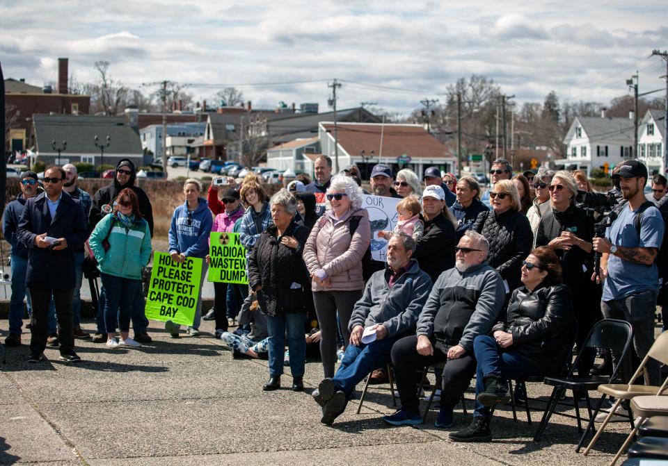 The crowd listens to a speech during the rally against Holtec releasing wastewater from the decommissioned Pilgrim Nuclear Power Station into Cape Cod Bay in Plymouth on Saturday, April 9, 2022.