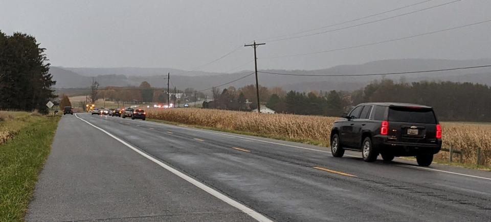A Maryland State Police medical helicopter is seen in the distance taking off Thursday afternoon from near Ringgold Pike and Misty Meadows Road south of the Mason-Dixon Line.