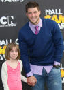 SANTA MONICA, CA - FEBRUARY 18: NFL player Tim Tebow (R) and Presley Collins attend the 2nd Annual Cartoon Network Hall of Game Awards at Barker Hangar on February 18, 2012 in Santa Monica, California. (Photo by David Livingston/Getty Images)