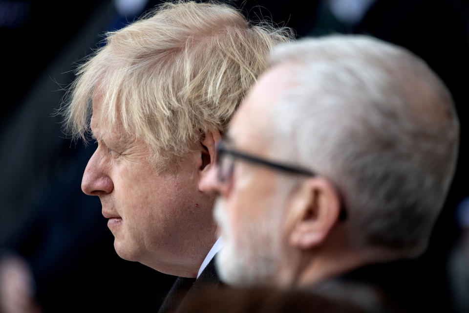 LONDON, ENGLAND - DECEMBER 02: (L-R) Prime Minister, Boris Johnson and Labour Leader, Jeremy Corbyn attend a vigil for victims Jack Merritt, 25, and Saskia Jones, 23 of the London Bridge attack and to honour the public and emergency services who responded to the incident at the Guildhall Yard on December 2, 2019 in London England.  Usman Khan, a 28 year old former prisoner convicted of terrorism offences, killed two people in Fishmongers' Hall at the North end of London Bridge on Friday, November 29, before continuing his attack on the bridge. Mr Khan was restrained and disarmed by members of the public before being shot by armed police.  (Photo by Leon Neal/Getty Images)