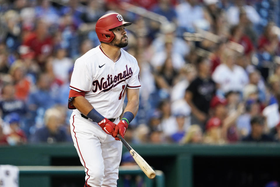 Washington Nationals' Kyle Schwarber watches his solo home run during the fifth inning of a baseball game against the New York Mets at Nationals Park, Monday, June 28, 2021, in Washington. (AP Photo/Alex Brandon)