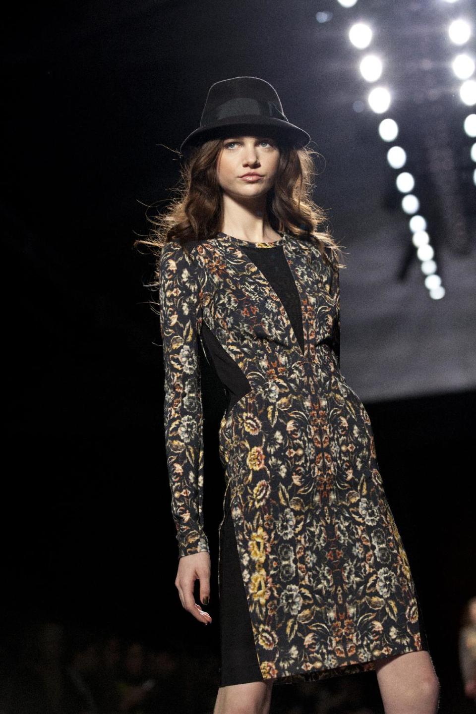 A model walks the runway during the Nicole Miller Fall 2013 fashion show during Fashion Week, Friday, Feb. 8, 2013, in New York. (AP Photo/Karly Domb Sadof)