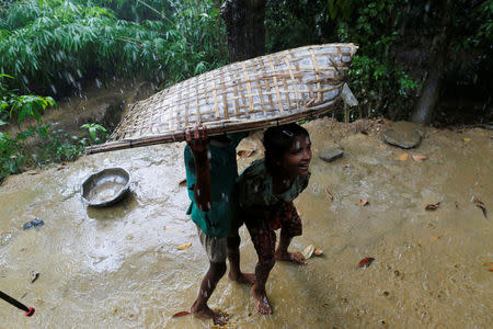 Rohingya Muslim boys are pictured in U Shey Kya village outside Maugndaw, in Rakhine state, Myanmar October 27, 2016. REUTERS/Soe Zeya Tun