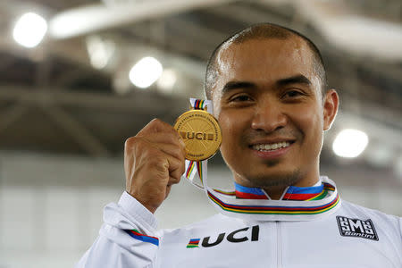 Cycling - UCI Track World Championships - Men's Keirin, Final - Hong Kong, China – 13/4/17 - Malaysia's Mohd Azizulhasni Awang celebrates with gold medal. REUTERS/Bobby Yip