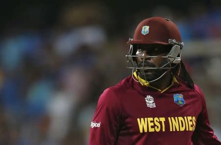 Cricket - West Indies v India - World Twenty20 cricket tournament semi-final - Mumbai, India - 31/03/2016. West Indies Chris Gayle walks off the field after his dismissal. REUTERS/Danish Siddiqui