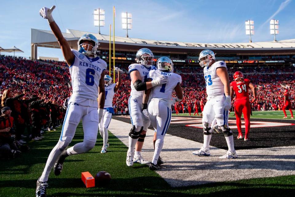 Kentucky Wildcats running back Ray Davis (1) celebrates scoring a touchdown against the Louisville Cardinals during the game at L&N Federal Credit Union Stadium in Louisville, Ky, Saturday, November 25, 2023. The 38-31 win by UK was the fifth consecutive in the Governor’s Cup rivalry.