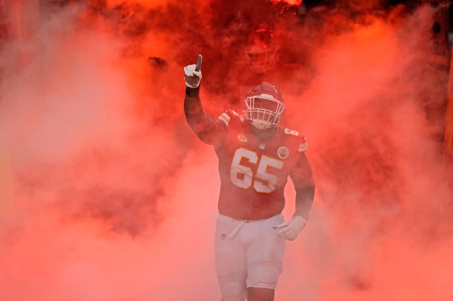 Kansas City Chiefs guard Trey Smith runs onto the field before an NFL football game against the Cincinnati Bengals Sunday, Dec. 31, 2023, in Kansas City, Mo. (AP Photo/Charlie Riedel)