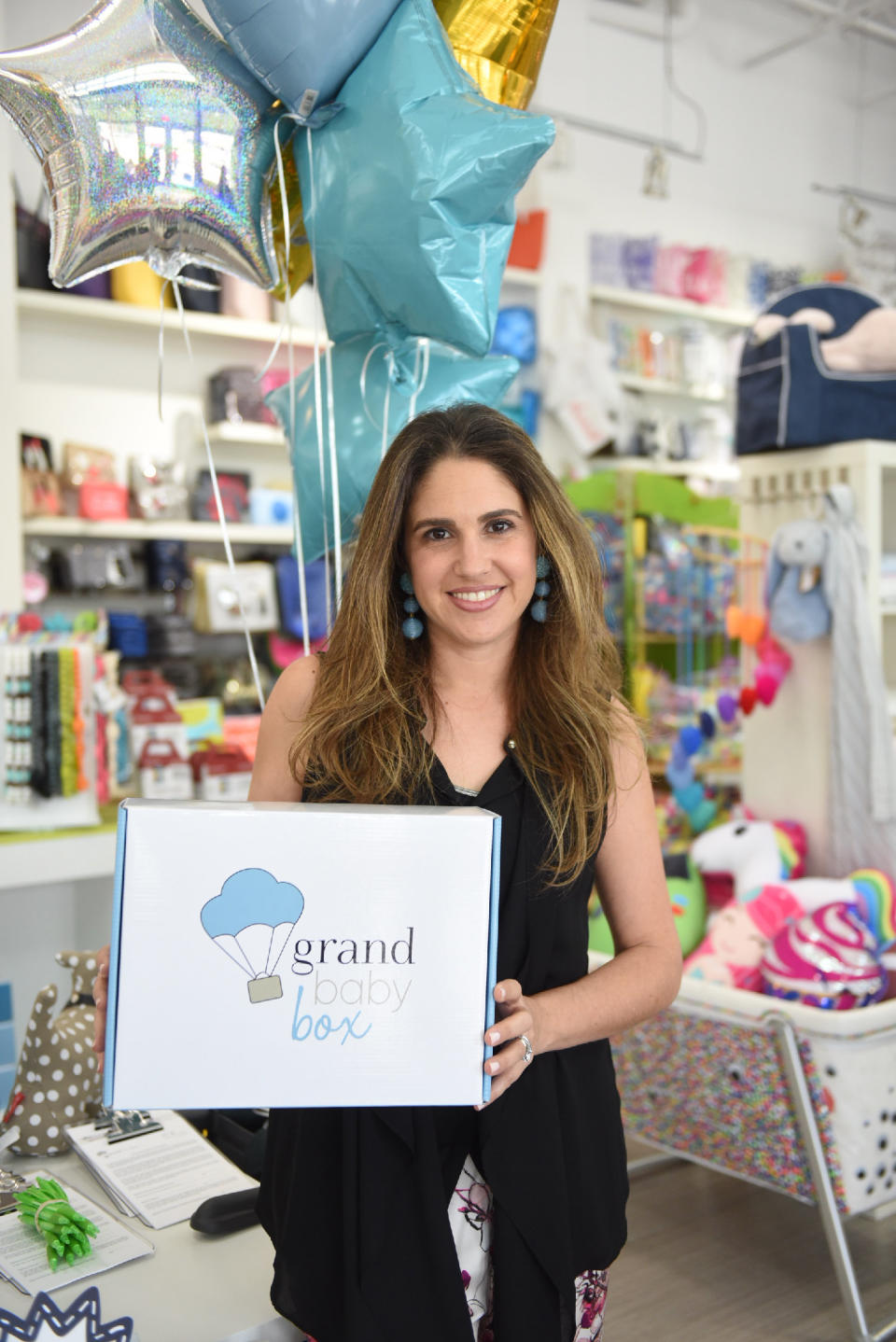 Francine Delarosa, owner of children's store Give Wink, is evolving her business to combat new challenges in the retail space. Delarosa is downsizing her store and focusing more on her concierge efforts, which include personal shopping and nursery design. (Photo: Francine Delarosa/Give Wink)