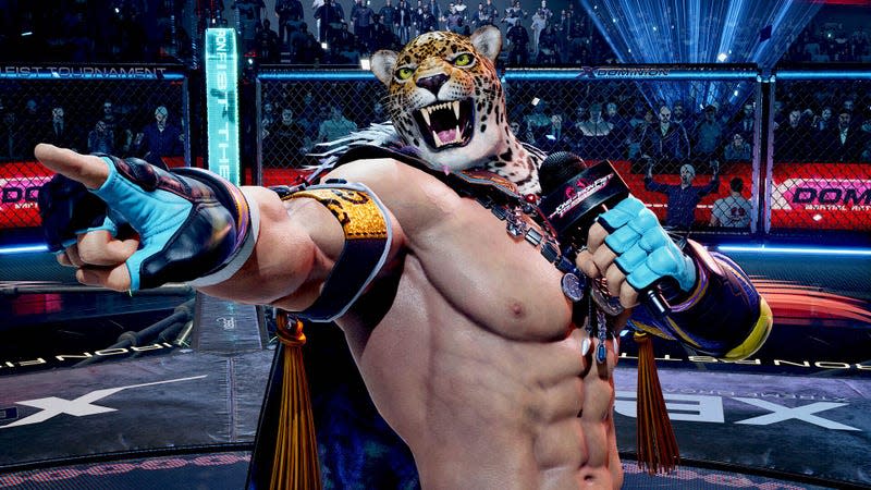 Tekken 8 wrestler King stands in a ring and points off screen with a microphone in his left hand.