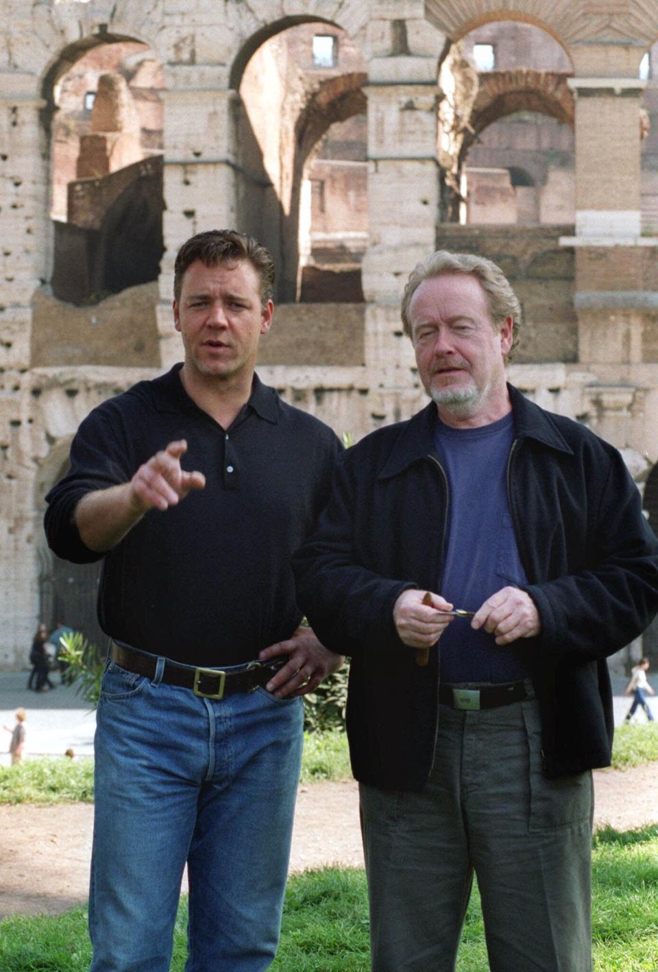 **FILE**Director Ridley Scott, right, and  actor Russell Crowe pose in front of Rome's Colosseum to promote the Italian premiere of the film "Gladiator"  in Rome, on April 26, 2000. The pair, who delivered the big Oscar winner that year,  reunite for "A Good Year," which was added to the lineup Tuesday, Aug. 22, 2006,  to be shown at the Toronto International Film Festival.  North America's largest film festival, the Toronto showcase runs Sept. 7-16 and will present 352 feature-length and short movies, including key Academy Awards contenders and top Hollywood releases coming this fall.AP Photo/Corrado Giambalvo)