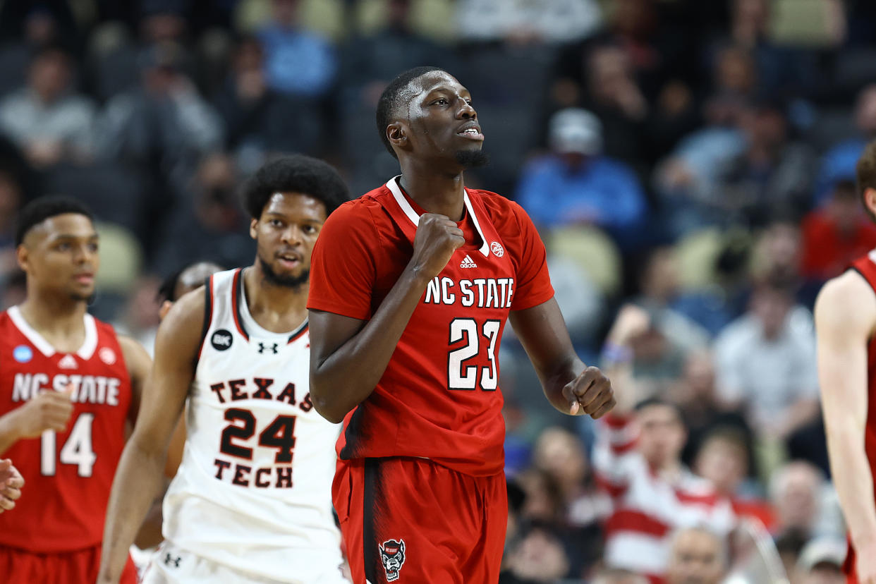 PITTSBURGH, PENNSYLVANIA - MARCH 21: Mohamed Diarra #23 of the North Carolina State Wolfpack reacts during the second half of a game against the Texas Tech Red Raiders in the first round of the NCAA Men's Basketball Tournament at PPG PAINTS Arena on March 21, 2024 in Pittsburgh, Pennsylvania. (Photo by Tim Nwachukwu/Getty Images)