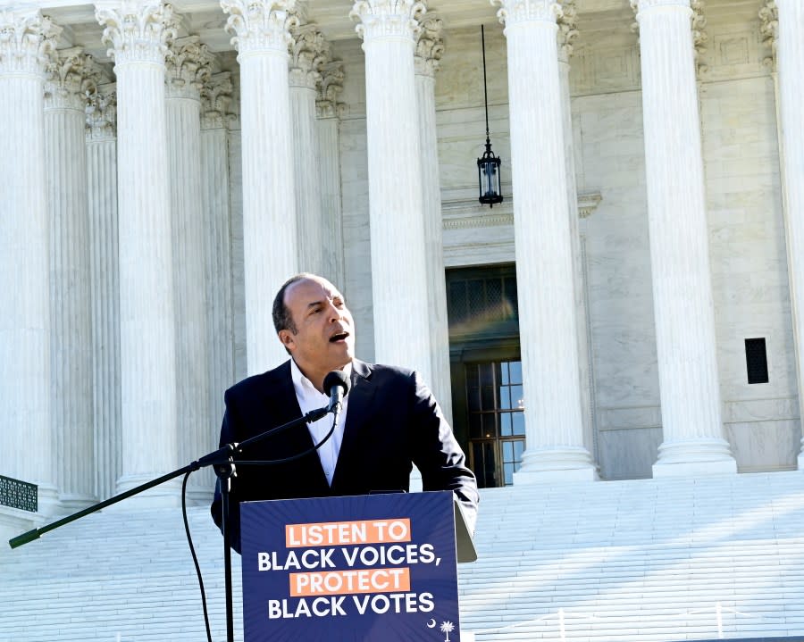 South Carolina congressional candidate Michael B. Moore speaks at a rally Oct. 11 outside of the Supreme Court. Voters and civil rights groups are calling on the top court to protect Black voters as justices weigh a case from South Carolina. (Photo by Shannon Finney/Getty Images for Rooted Logistics)