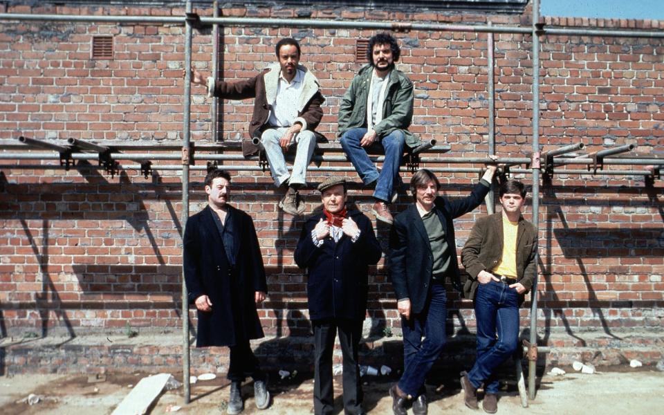 Igbon, top left, next to Michael Angelis and other cast members of Alan Bleasdale's Boys from the Blackstuff  - Television Stills