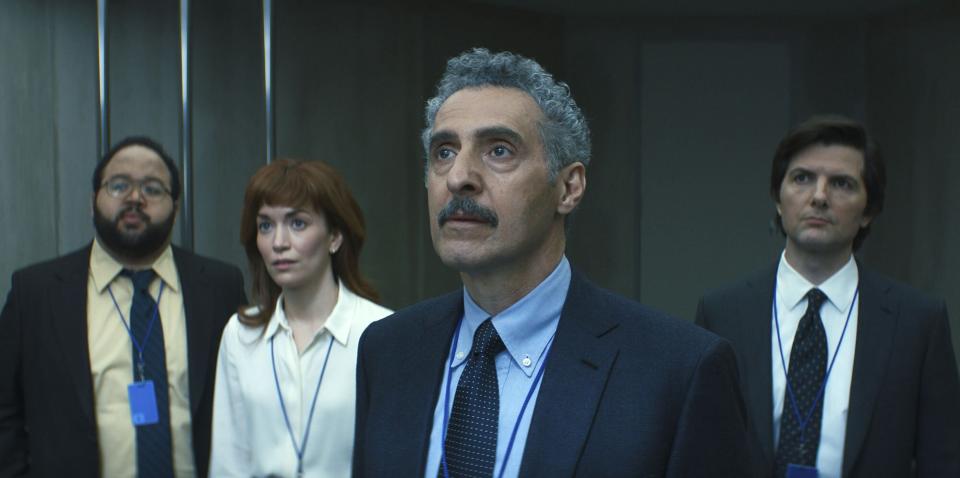 Zach Cherry, Britt Lower, John Turturro and Adam Scott in “Severance,”