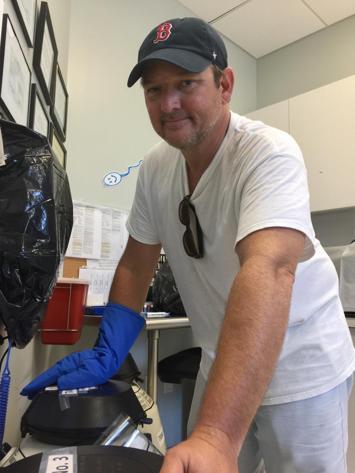 Dr. Hernandez-Rey in his fertility clinic on Thursday, making sure the liquid nitrogen was set to safely store frozen samples for up to two weeks.&nbsp; (Photo: Dr Hernandez-Rey)