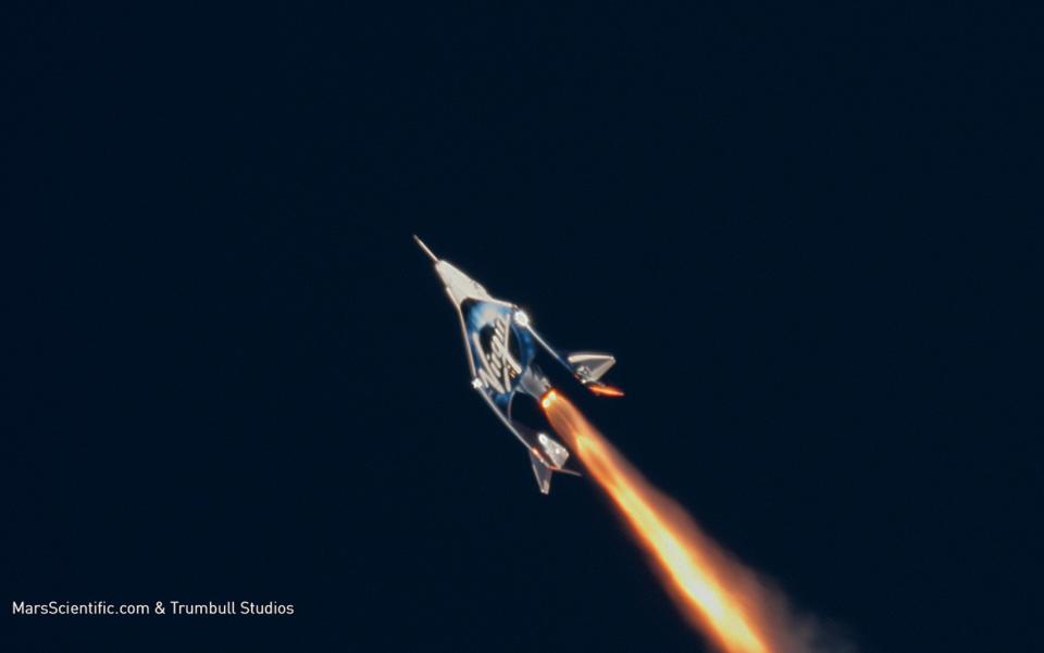 Virgin Galactic's VSS Unity zooms toward space during a rocket-powered test flight on Dec. 13, 2018. <cite>MarsScientific.com/Trumbull Studios/Virgin Galactic</cite>