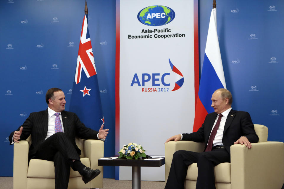Russian President Vladimir Putin, right, chats with New Zealand Prime Minister John Key during their meeting at the APEC summit in Vladivostok, Russia, Saturday, Sept. 8, 2012. (AP Photo/Mikhail Metzel, Pool)