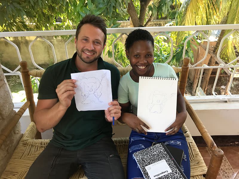 Matt with a survivor in a Haitian safe house.