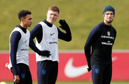 Soccer Football - England Training & Media Day - St. George’s Park, Burton Upon Trent, Britain - March 20, 2018 England's Alfie Mawson, Jordan Henderson and Trent Alexander-Arnold during training Action Images via Reuters/Andrew Boyers