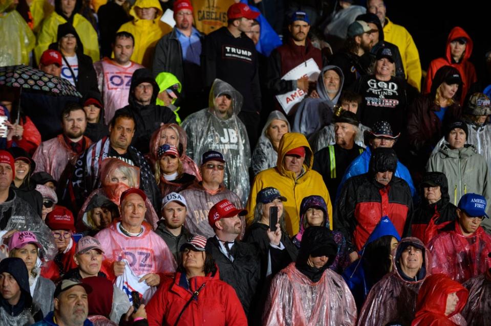 Rain-drenched Trump supporters attend a MAGA rally in Greensburg, Pennsylvania (Getty Images)