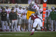 Ohio State tight end Jeremy Ruckert (88) is tackled by Indiana defensive back Devon Matthews (1) in the first half during an NCAA college football game in Bloomington, Ind., Saturday, Oct. 23, 2021. (AP Photo/AJ Mast)