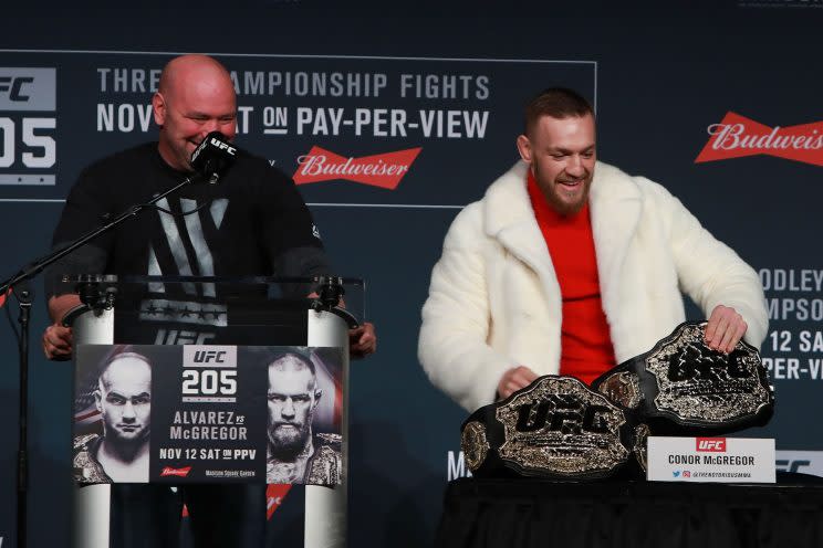 UFC president Dana White (L) says that lightweight champion Conor McGregor (R) may still wind up fighting boxer Floyd Mayweather. (Getty Images)