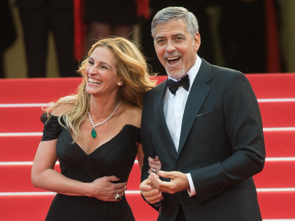 Julia Roberts and George Clooney laugh at the Cannes Film Festival