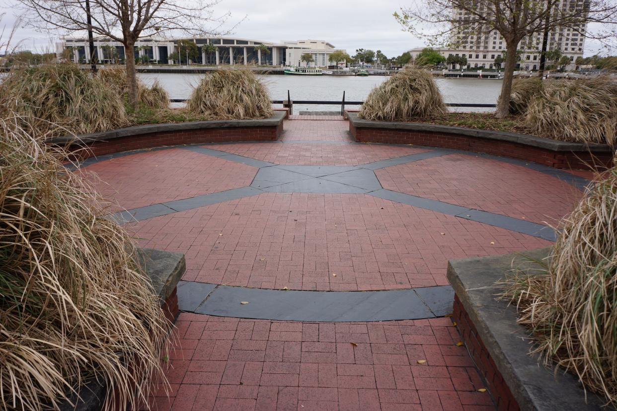 FILE - Echo Square visitors experience strange sounds when they stand on the "X." It's located in Savannah at 305 East River St.