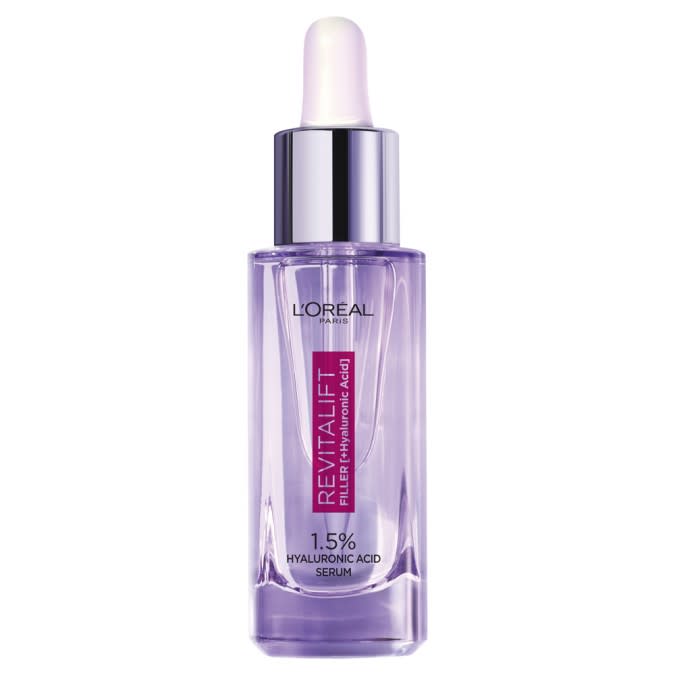 L'ORÉAL PARIS Revitalift Filler 1.5% Hyaluronic Acid Serum in purple bottle, with silver and white dropper.