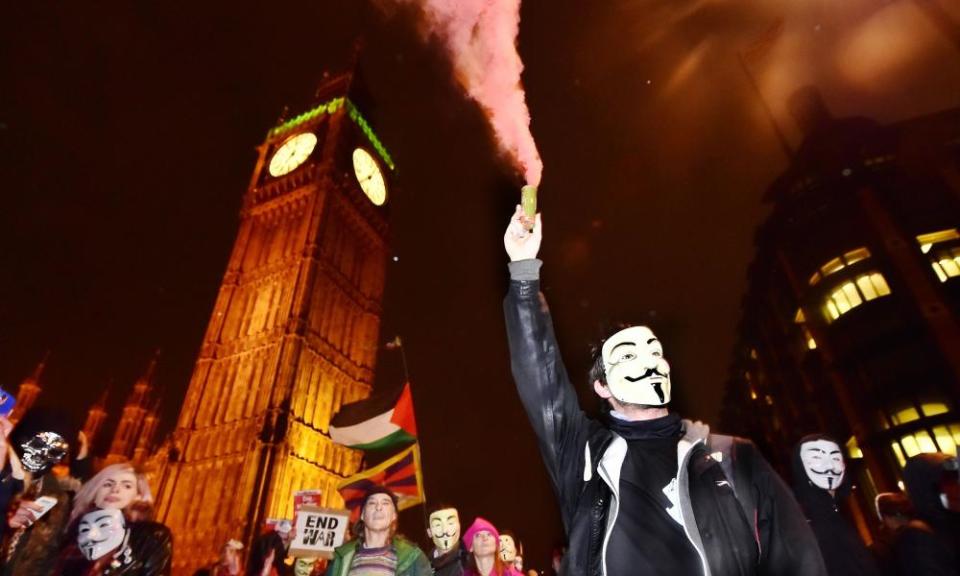 Anti-capitalism demonstrators rally in London. 