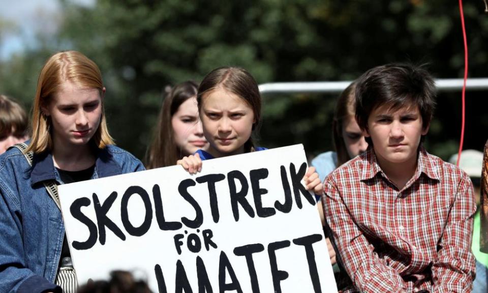 Activist Greta Thunberg joins a climate strike march in Iowa City.