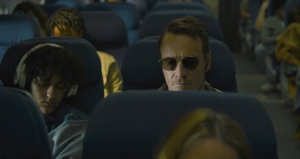 This image released by Netflix shows Michael Fassbender in a scene from "The Killer." (Netflix via AP)