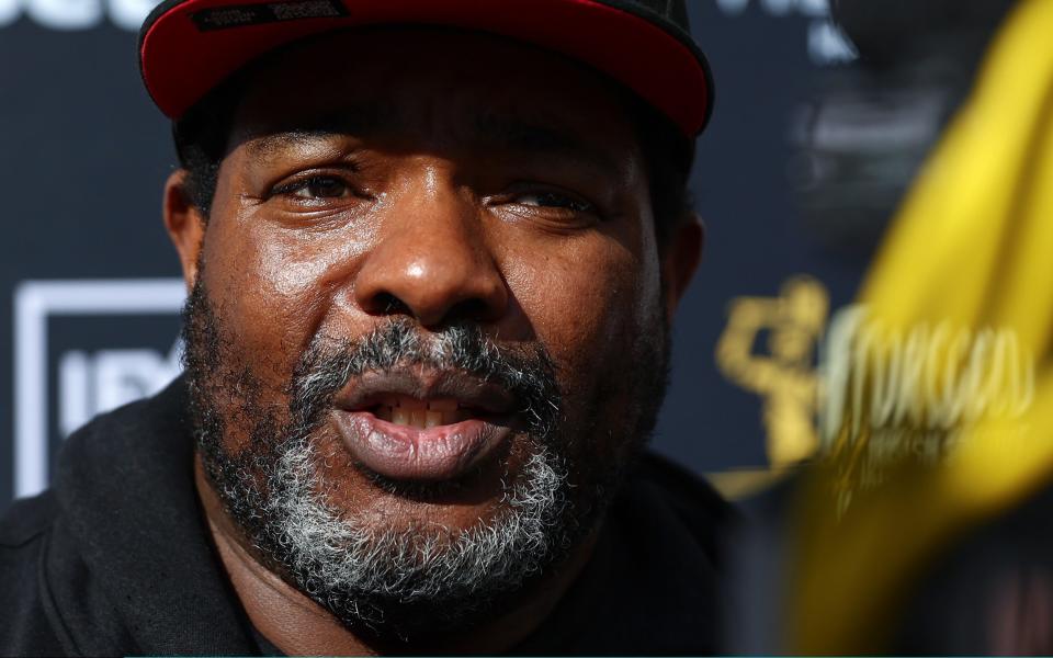 Brian McIntyre, trainer of Chris Eubank Jr is interviewed during the Chris Eubank Jr v Liam Smith II Media workout at in St Anne's Square on August 30, 2023 in Manchester, England