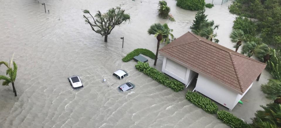 This parking lot near Naples Park flooded during Hurricane Ian but by the following morning, the water had drained, leaving behind mud and debris.