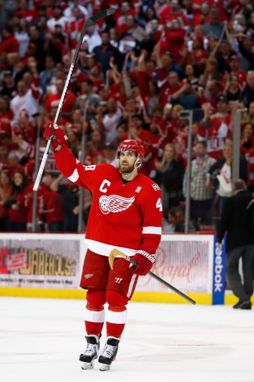 Henrik Zetterberg of the Detroit Red Wings salutes the fans after their 4-1 win over the New Jersey Devils, at the final NHL game to be played at Joe Louis Arena in Detroit, Michigan, on April 9, 2017