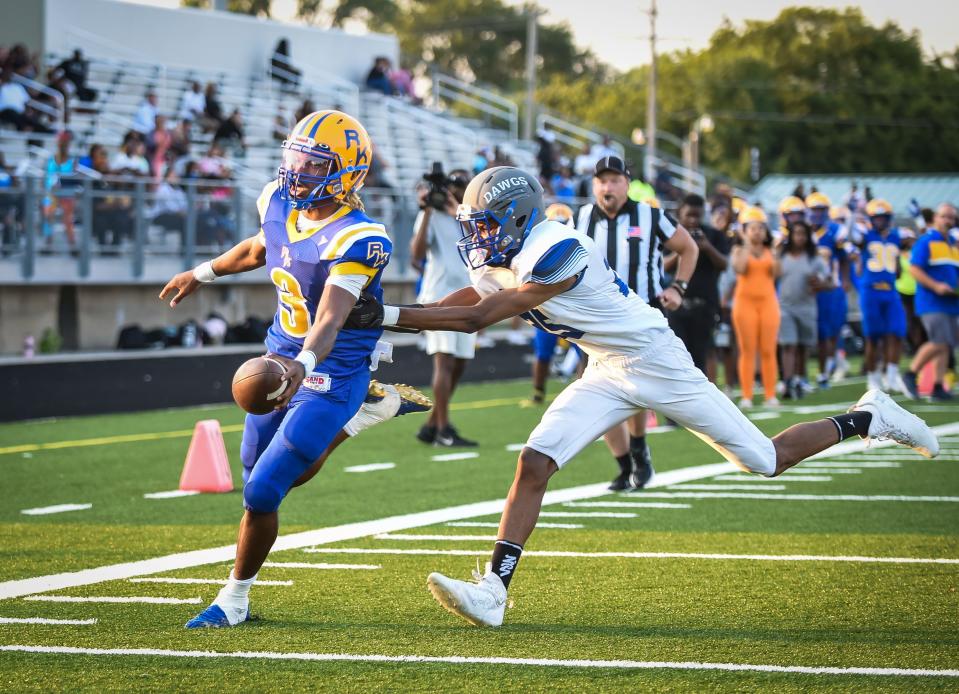 Milwaukee King's Nate White runs for a touchdown against the Reagan Huskies during the first quarter of a Milwaukee City Conference football game Thursday, September 8, 2022, at Custer Stadium in Milwaukee, Wisconsin.