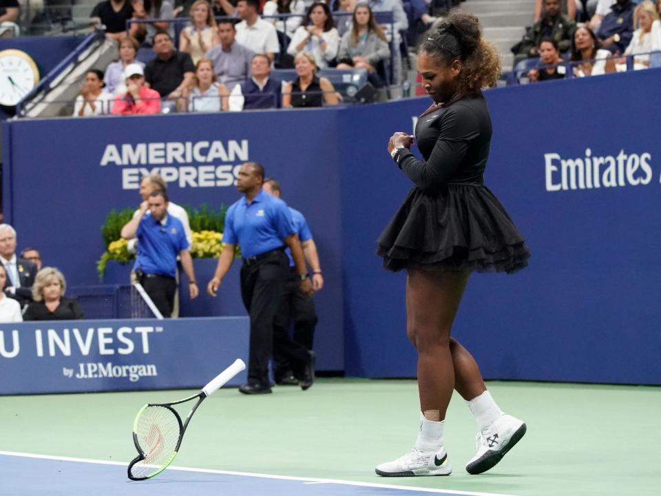 Serena Williams smashes her racket at the 2018 US Open.