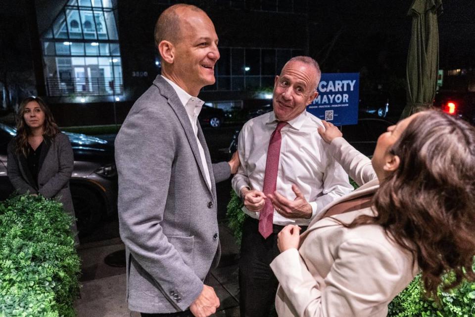 Sacramento mayoral candidate Kevin McCarty shares some laughs with Mayor Darrell Steinberg and Councilwoman Karina Talamantes at his election watch party at the Green Room in East Sacramento on Tuesday, March 5, 2024.