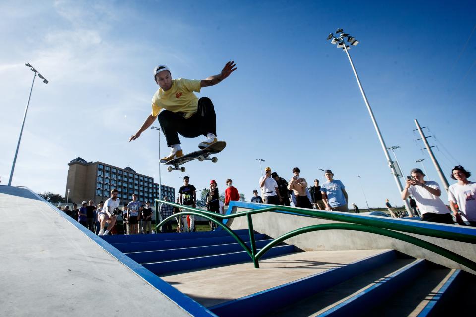 Skaters attempt to ollie a double stair set at Lauridsen Skatepark in 2021.