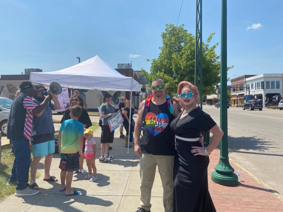 Drag performer Wesley Fox stands with a friend at the Pride rally hosted by the River Valley Equality Center and the Committee for Social Advancement.