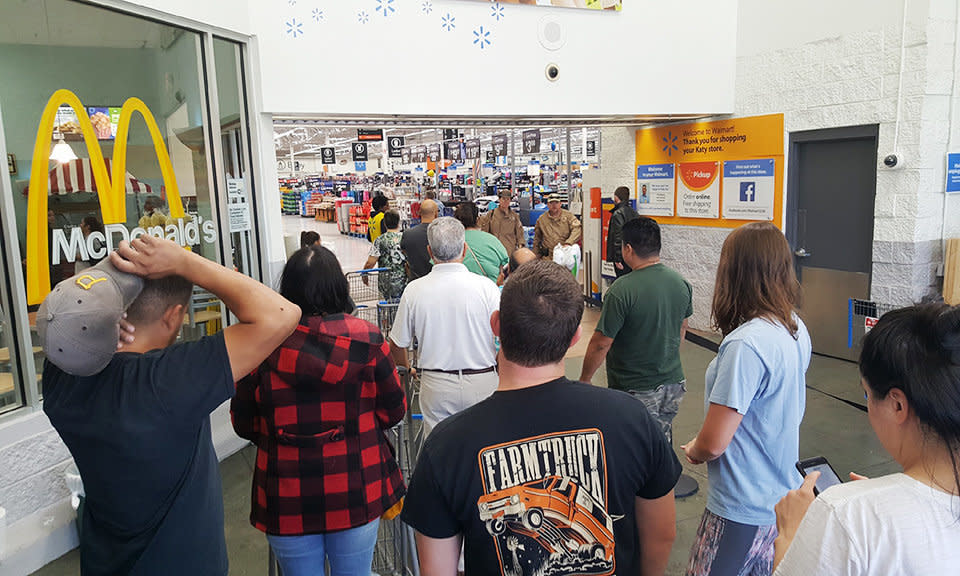 People wait to enter the Walmart in Katy, Texas, on Wednesday. (Photo: David Lohr/HuffPost)