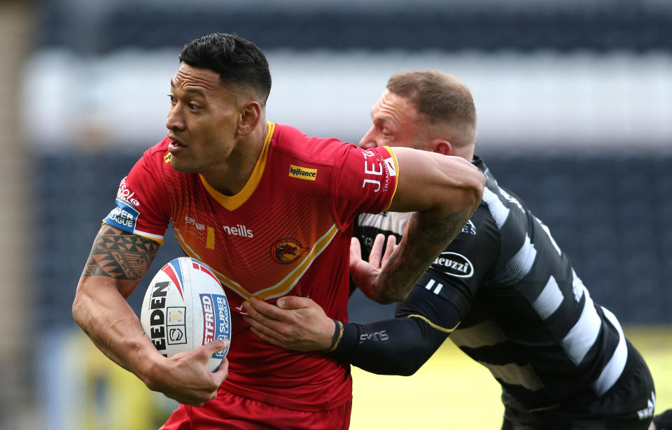 Israel Folau runs past past Josh Griffin during the Betfred Super League match.